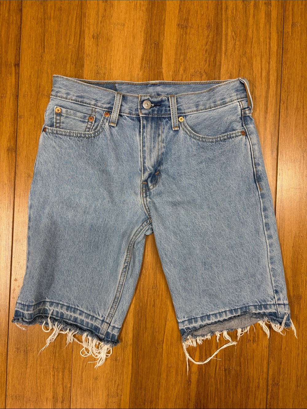 Levi’s Light Wash Frayed Hem Denim Shorts
